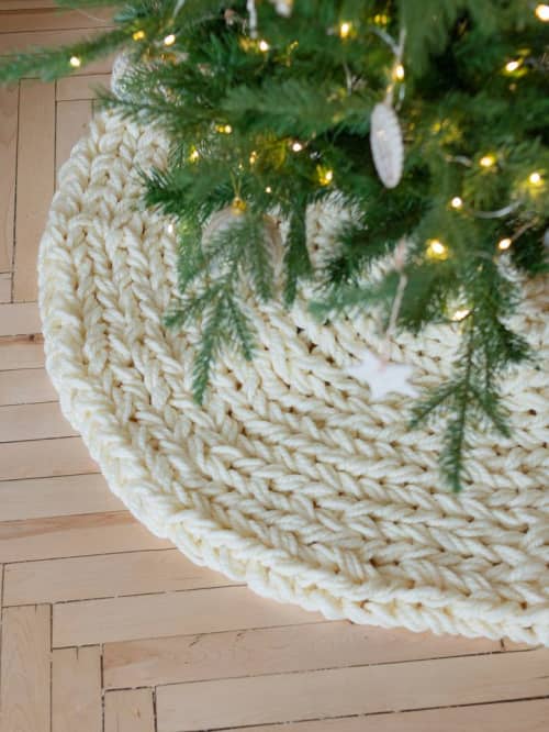Boho knitted Christmas tree skirt in creamy color | Small Rug in Rugs by Anzy Home. Item made of fabric
