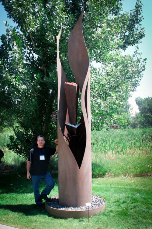 "Fire & Ice" | Sculptures by Brian Schader. Item composed of steel & stone