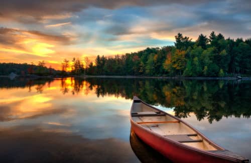 Canoe on Bob's Lake | Photography by Judy Reinford. Item composed of paper