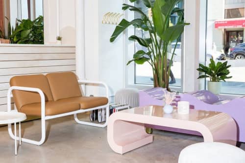 “Wave Bench” | Benches & Ottomans by Objects for Objects | Chillhouse Soho Flagship in New York. Item made of wood & brass