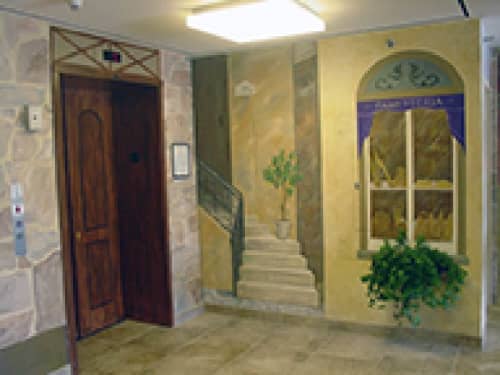 Italian-style lobby | Murals by Anne Giancola