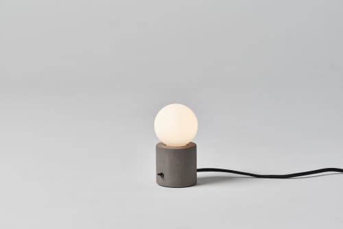 Castle Muse Table Lamp | Lamps by SEED Design USA. Item composed of concrete and glass
