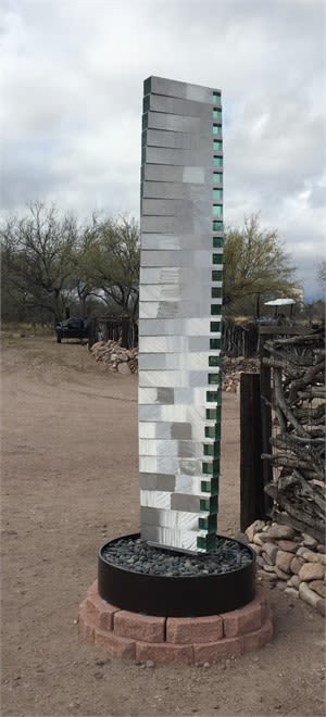"Complexity of Mien | Sculptures by Brian Schader | K Newby Gallery & Sculpture Garden in Tubac. Item made of steel with stone