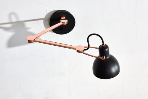Laito Mini Wall Sconce L | Sconces by SEED Design USA. Item made of steel