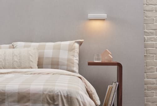 Mumu Wall Sconce | Sconces by SEED Design USA. Item made of aluminum