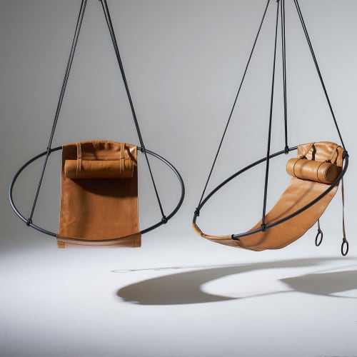 Studio Stirling Twin Deal in Soft Ochre Leather | Swing Chair in Chairs by Studio Stirling. Item composed of steel & leather
