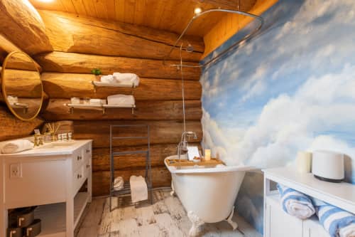 Airbnb Mural: Cloud Sky Mural behind Bathtub | Murals by Devona Stimpson. Item made of synthetic