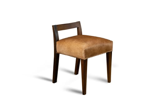 Low Side Chair in Argentine Rosewood and Hair Hide, Umberto | Dining Chair in Chairs by Costantini Designñ. Item composed of wood and leather in contemporary or modern style