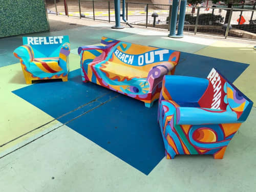 Art Lounge Chair | Street Murals by Mario E. Figueroa, Jr. (GONZO247) | Jones Plaza in Houston. Item made of synthetic