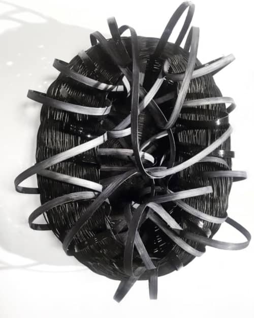 Woven rattan sculpture with rubber | Wall Sculpture in Wall Hangings by Charlotte Blake. Item composed of synthetic in contemporary style