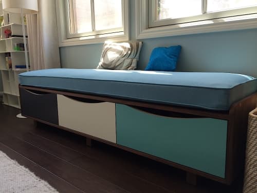 Toy Cabinet and Storage Bench | Storage by Jason Lees Design. Item made of leather