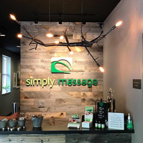 NewGROWTH floating chandeliers | Chandeliers by CP Lighting | Simply Massage in Glenwood Springs. Item composed of aluminum