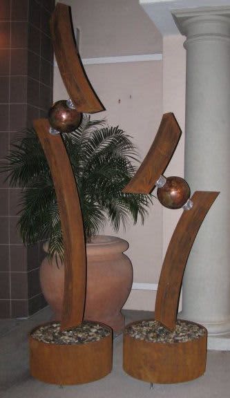 Entwined | Public Sculptures by Brian Schader. Item composed of copper and stone
