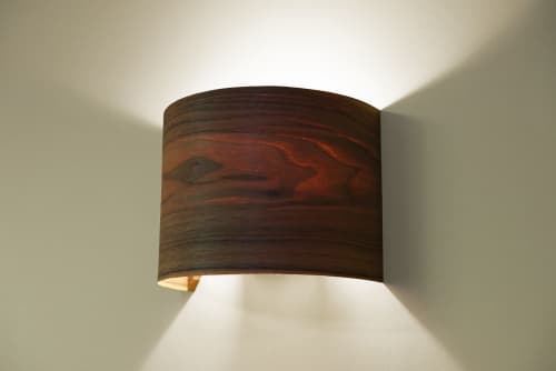 Arc walnut | Sconces by Studio Vayehi. Item made of metal compatible with minimalism and contemporary style