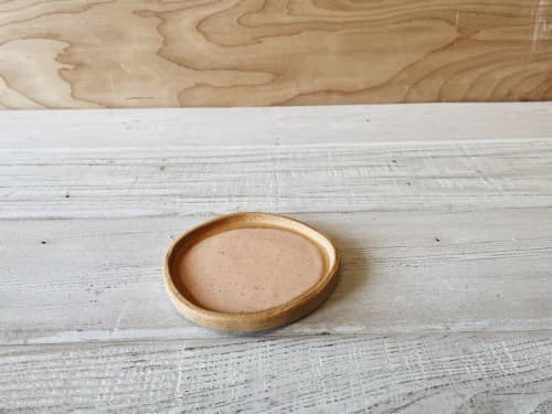 Simple Circle Dish in Peach | Saucer in Tableware by Bridget Dorr. Item made of ceramic
