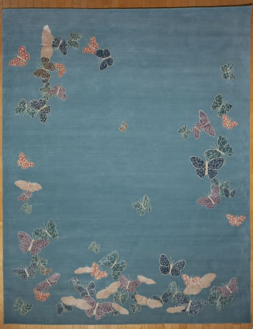 Spirit in the sky. Blue background rug with butterflies | Area Rug in Rugs by Sergio Mannino Studio. Item composed of fiber
