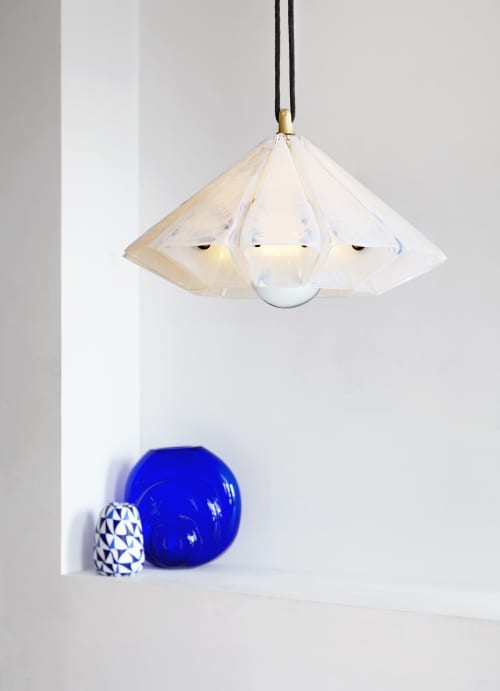 Sirius Chandelier | Chandeliers by Bianco Light + Space | The Future Perfect in New York. Item made of brass & leather compatible with modern style