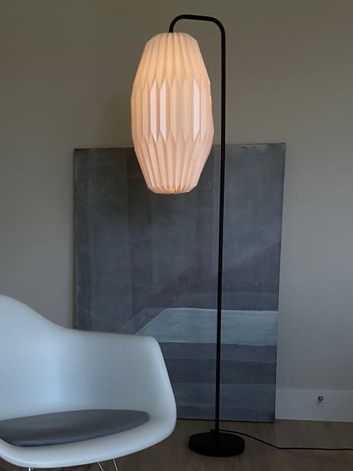 Gold floor lamp with a pleated oval long lampshade | Lamps by Studio Pleat. Item made of aluminum with paper works with minimalism & contemporary style