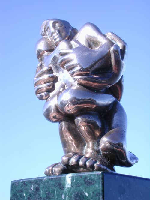 The Hug | Sculptures by Nina Winters. Item made of bronze with marble