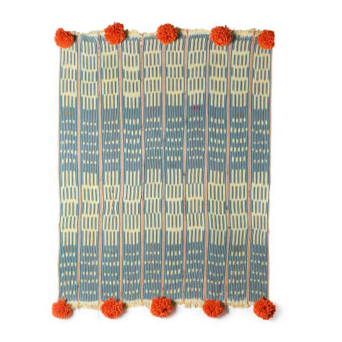 baoule pom pom throw peacock/tangerine poms | Linens & Bedding by Charlie Sprout. Item made of cotton