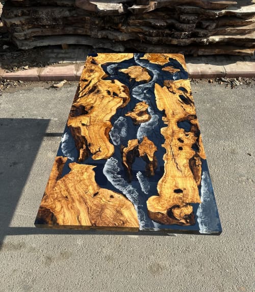 Mediterranean Olive Wood Ocean Epoxy Resin Live Edge Table | Dining Table in Tables by Tinella Collection. Item composed of wood in minimalism or art deco style