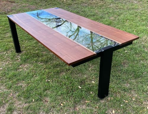 Contemporary steel and walnut dining table | Tables by Aaron Smith Woodworker. Item composed of walnut and brass in contemporary or eclectic & maximalism style