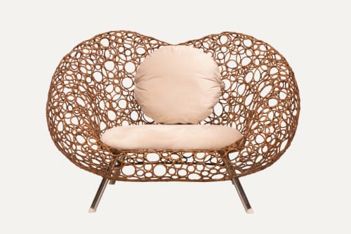Bubbler Rattan Lounge Chair | Chairs by Monarca Goods. Item composed of wood and fiber in boho or contemporary style