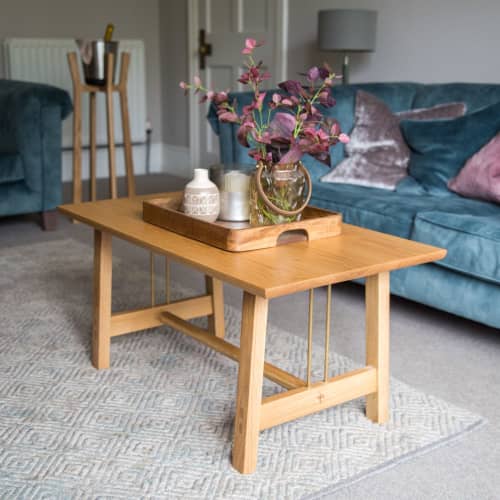 Coffee table | Tables by Majid Lavasani. Item made of oak wood & brass