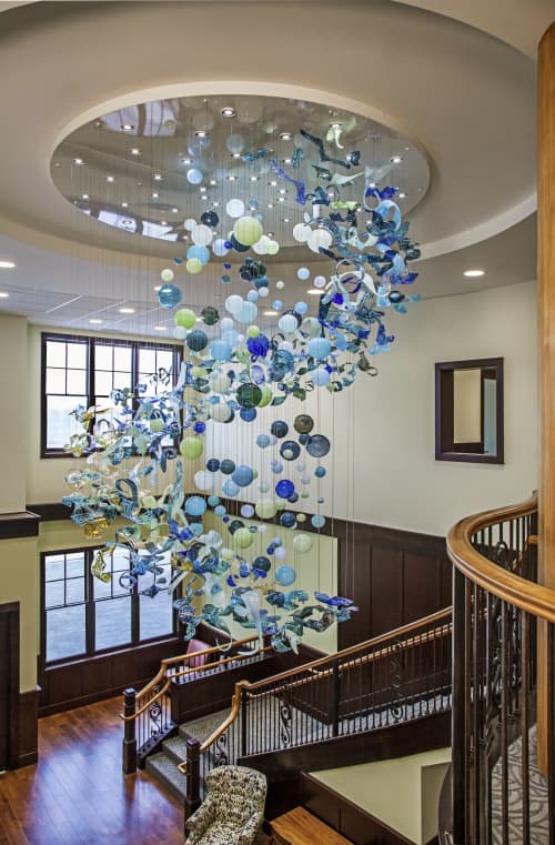 L’eau de Vie | Chandeliers by April Wagner, epiphany studios | The Inn At Harbor Shores in Saint Joseph. Item composed of glass