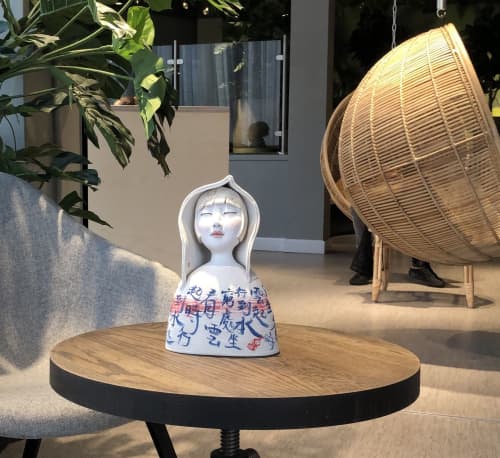 Girl in Hoody ceramic sculpture | Sculptures by Jenny Chan | HYGGE Sheffield in Sheffield City Centre. Item composed of ceramic