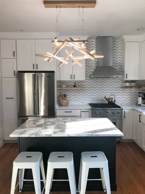 INTERSTELLAR XL chandelier | Chandeliers by Next Level Lighting. Item made of wood