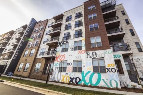 XO Wall Mural | Murals by Kyle Mosher | Alexan Optimist Park in Charlotte