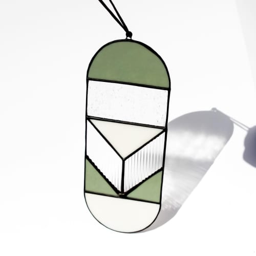 Oval Stained Glass Suncatcher | Glasswork in Wall Treatments by Studio Adeline. Item made of metal with glass works with boho & minimalism style