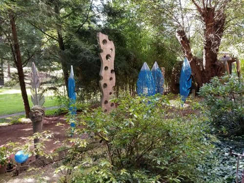 "Tower of Holes with Blue Feathers" | Public Sculptures by J.A. Mayer "Sculptor". Item made of stone