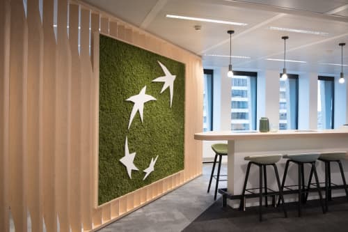 Green logo made out of lichen for BNP Paribas Fortis | Interior Design by Greenmood | BNP Paribas Real Estate - Head Office in Bruxelles