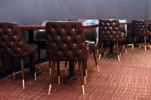 Tufted Club Chair - Model 3528 | Lounge Chair in Chairs by Richardson Seating Corporation | 10pin Bowling Lounge in Chicago. Item composed of brass