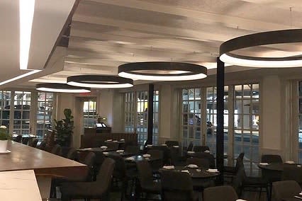 Custom Aluminum Circle Fixtures | Chandeliers by CP Lighting | Mediterraneo Restaurant in Greenwich. Item composed of aluminum