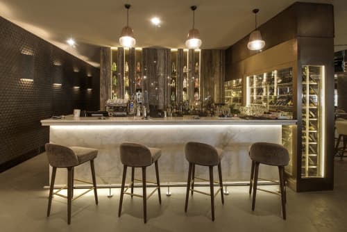 Favo Natural Stone Wall Tiles | Tiles by Lithos Design | Roberto's Ristorante in دبي. Item made of stone