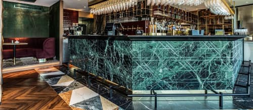 Tartan marble wall covering | Paneling in Wall Treatments by Lithos Design | Van der Valk Hotel Breda Princeville in Breda. Item composed of marble