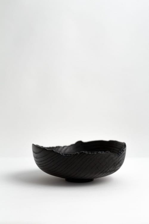 Wabi-sabi bowl in ash | Dinnerware by Pooja Pawaskar. Item composed of wood