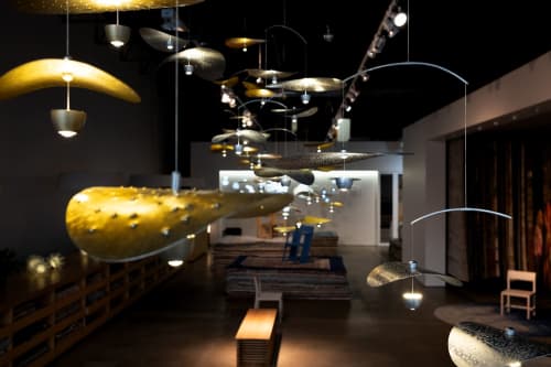 Nymphaea Installation | Lighting Design by Claudine Gevry Studio | Salari Fine Carpets in Vancouver. Item made of aluminum