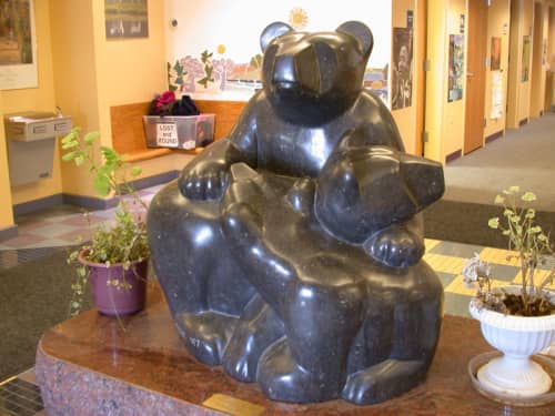 Bear Hug | Public Sculptures by Jim Sardonis | Helen A Thompson School in West Gardiner. Item made of marble