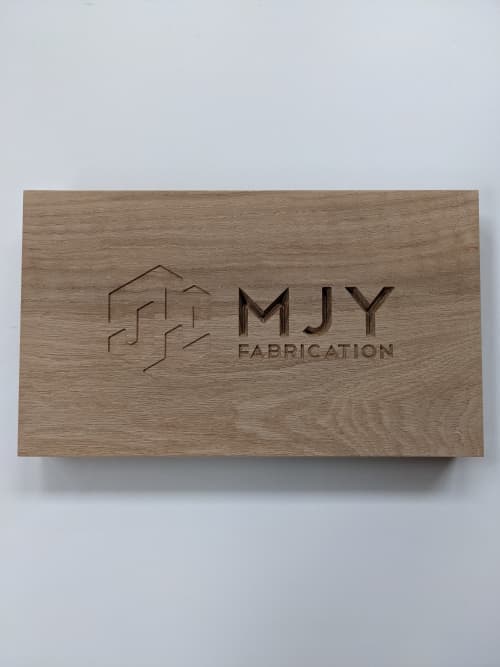 Custom engraving in solid wood | Signage by MJY Fabrication. Item made of wood
