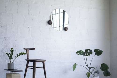 Round Wall Mirror With Geometric Hardwood Knobs | Decorative Objects by THE IRON ROOTS DESIGNS. Item composed of glass