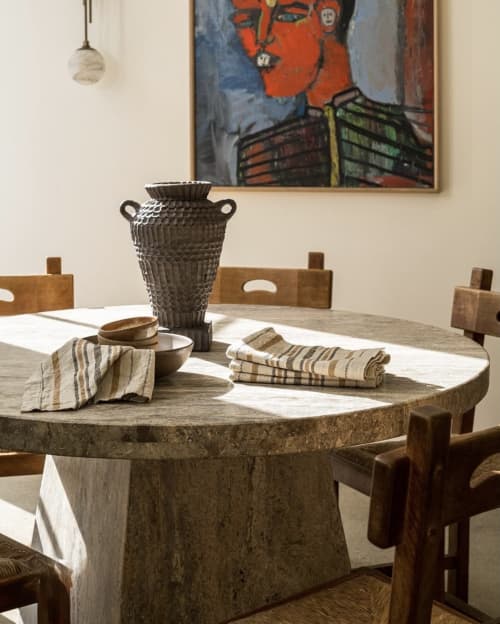 Silver Travertine Round Pedestal Dining Table | Tables by Phidias Atelier. Item made of marble