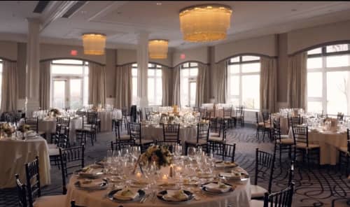 Large custom chandelier by Prestige Chandelier | Chandeliers by Custom Lighting by Prestige Chandelier | Philadelphia Country Club in Gladwyne. Item made of steel & glass