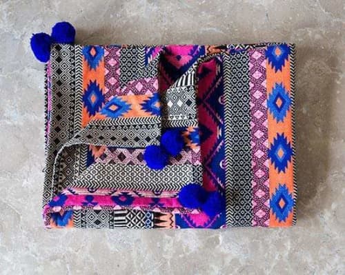 Felipe Pom Pom Throw, Blue | Linens & Bedding by Casa Amarosa. Item composed of cotton