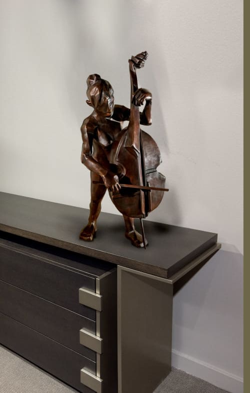 Woman musician playing the bass | Sculptures by Dina Angel-Wing | Berkeley, CA in Berkeley. Item composed of bronze