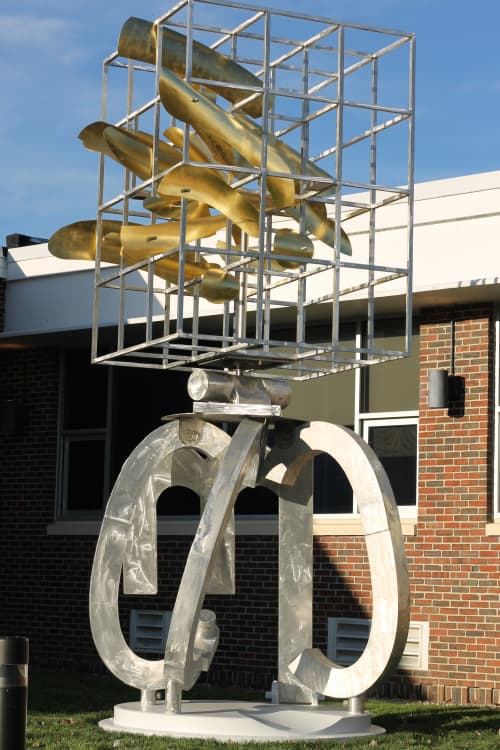 "KAIROS" (Greek for a special moment in time) | Public Sculptures by James Strickland | Central Maine Community College in Auburn. Item made of steel