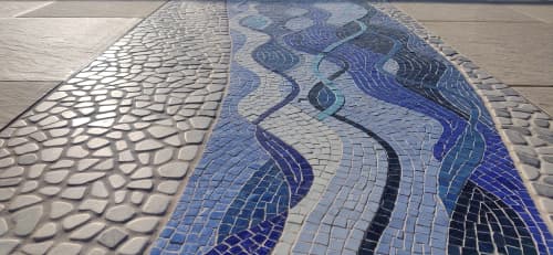Mosaic patio inlay suggesting a river | Public Mosaics by JK Mosaic, LLC. Item made of stone
